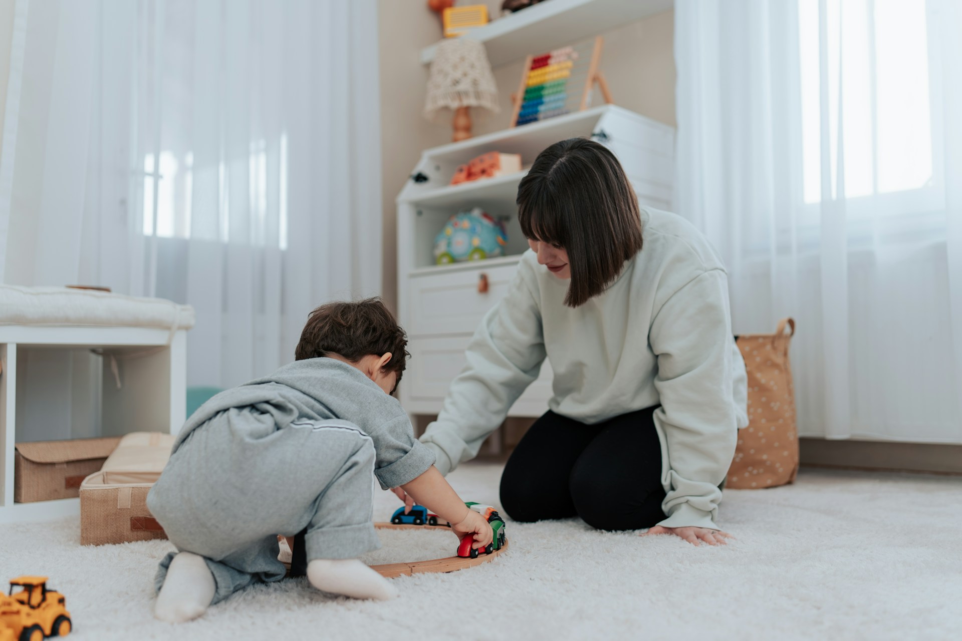 Preschool child interacting with peers
